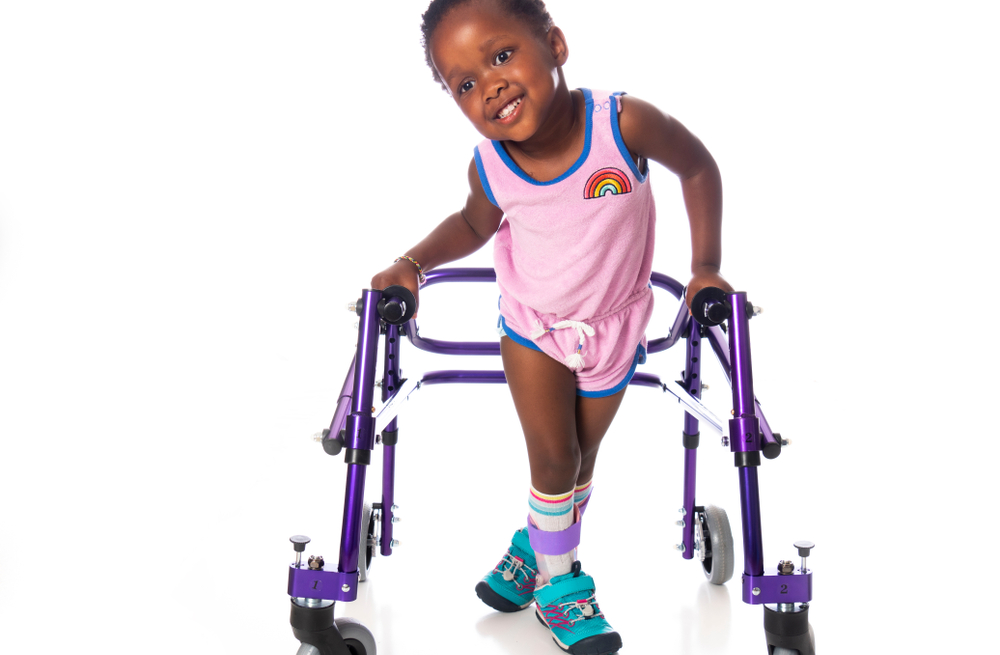 young girl with cerebral palsy smiling in PA