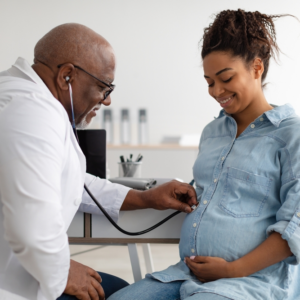 parents at a check up with OBGYN in Philadelphia hospital to prevent birth injury