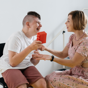 mother speaking with child with cerebral palsy