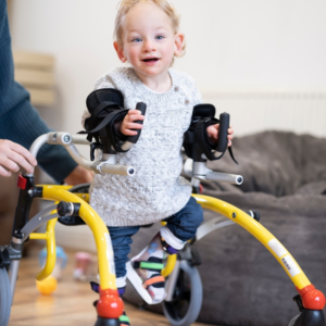 child with brachial plexus injury walking and smiling in Philadelphia