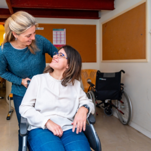 woman with cerebral palsy looking at mom in PA