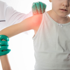 child's arm being checked after a shoulder dystocia injury