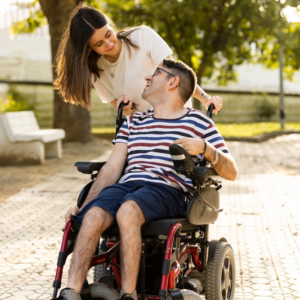 child with cerebral palsy smiling at his caregiver in Philadelphia