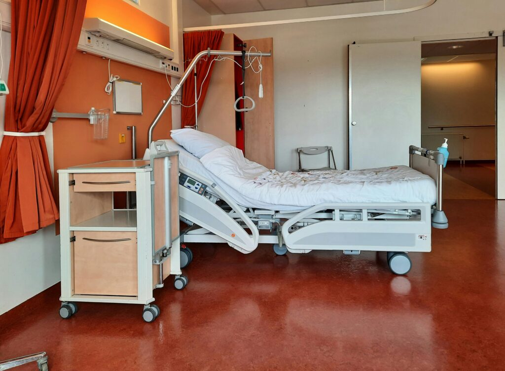 This orange hospital room transforms when there is failure to escalate during labor, as it may become a place of medical negligence.