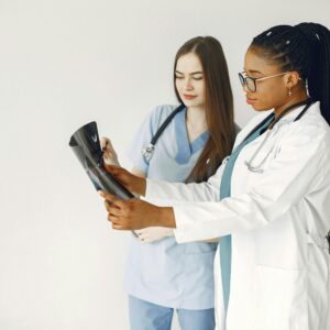 Two medical professionals looking at test results with a VUS present.