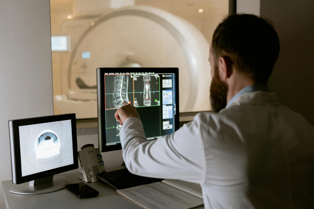 A doctor beginning to look at MRI and diffusion-weighted imaging to check for neurological damage.