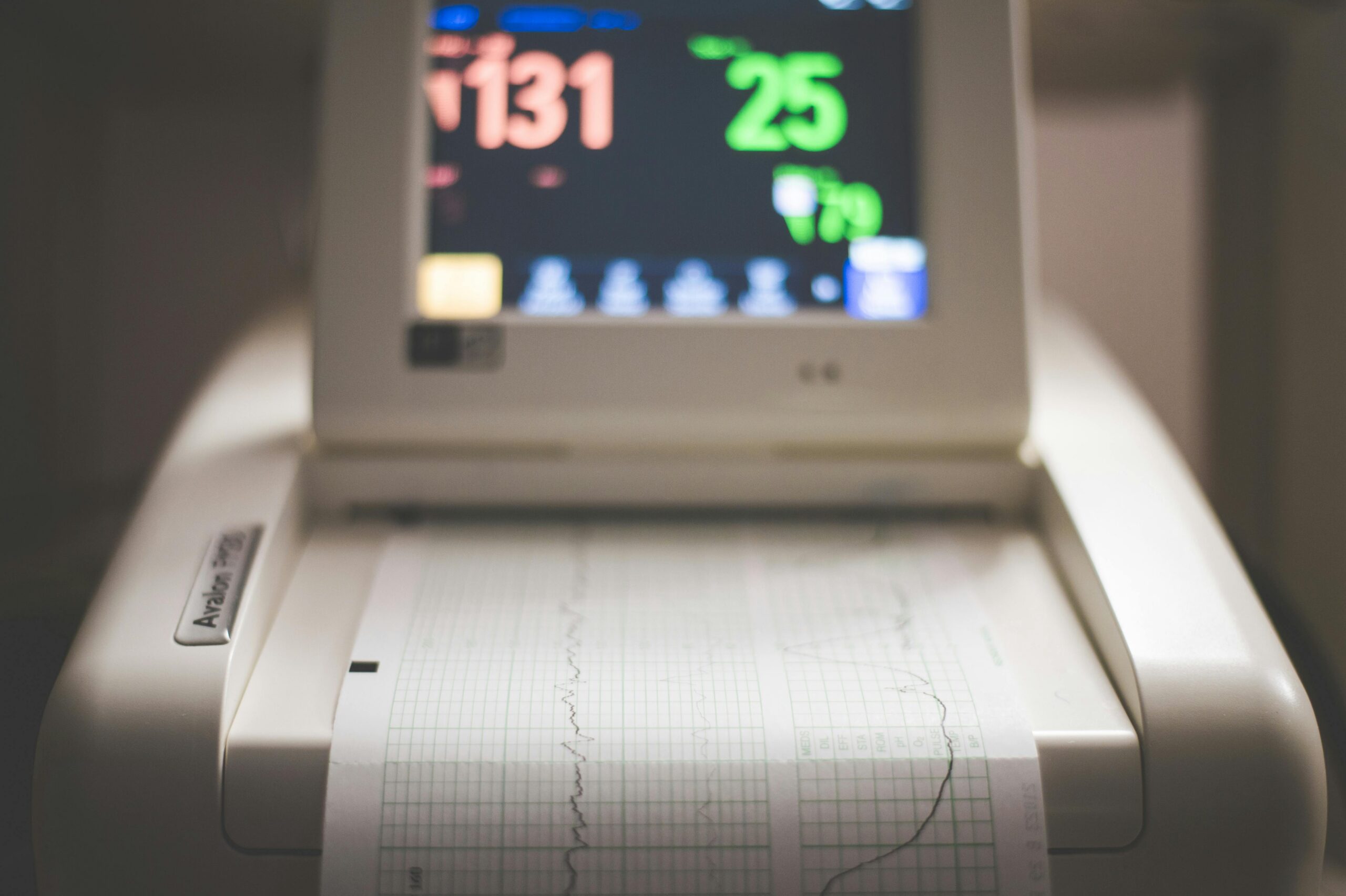 A fetal monitoring machine that shows heart tracings. Misreading this data may be problematic.