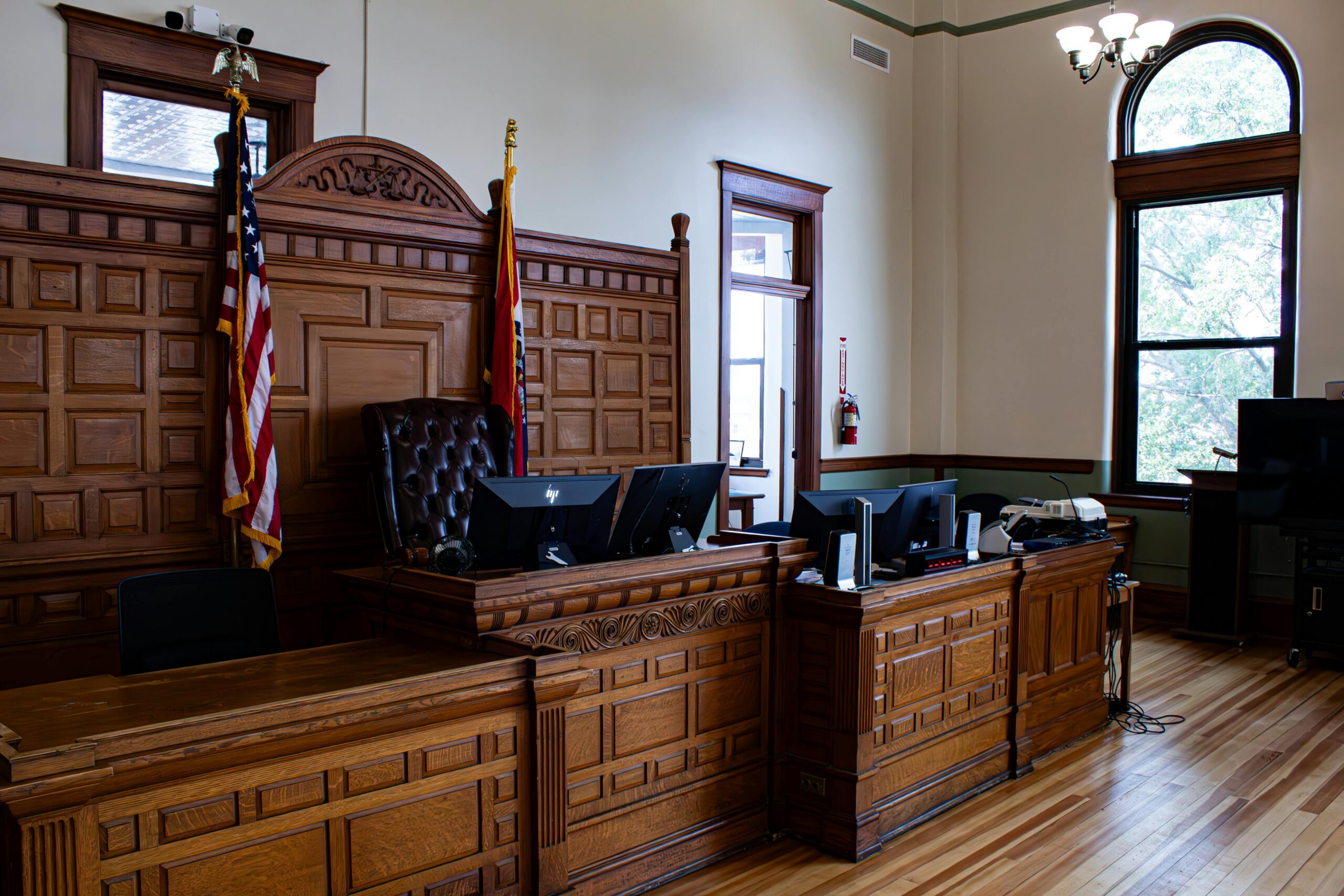 A court room where judges evaluate analyses and evidence about medical malpractice cases.