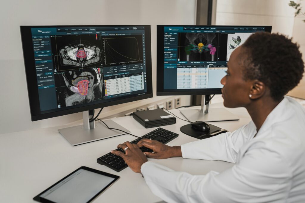 A doctor reviewing medical data that will soon be used for visual evidence in a case.