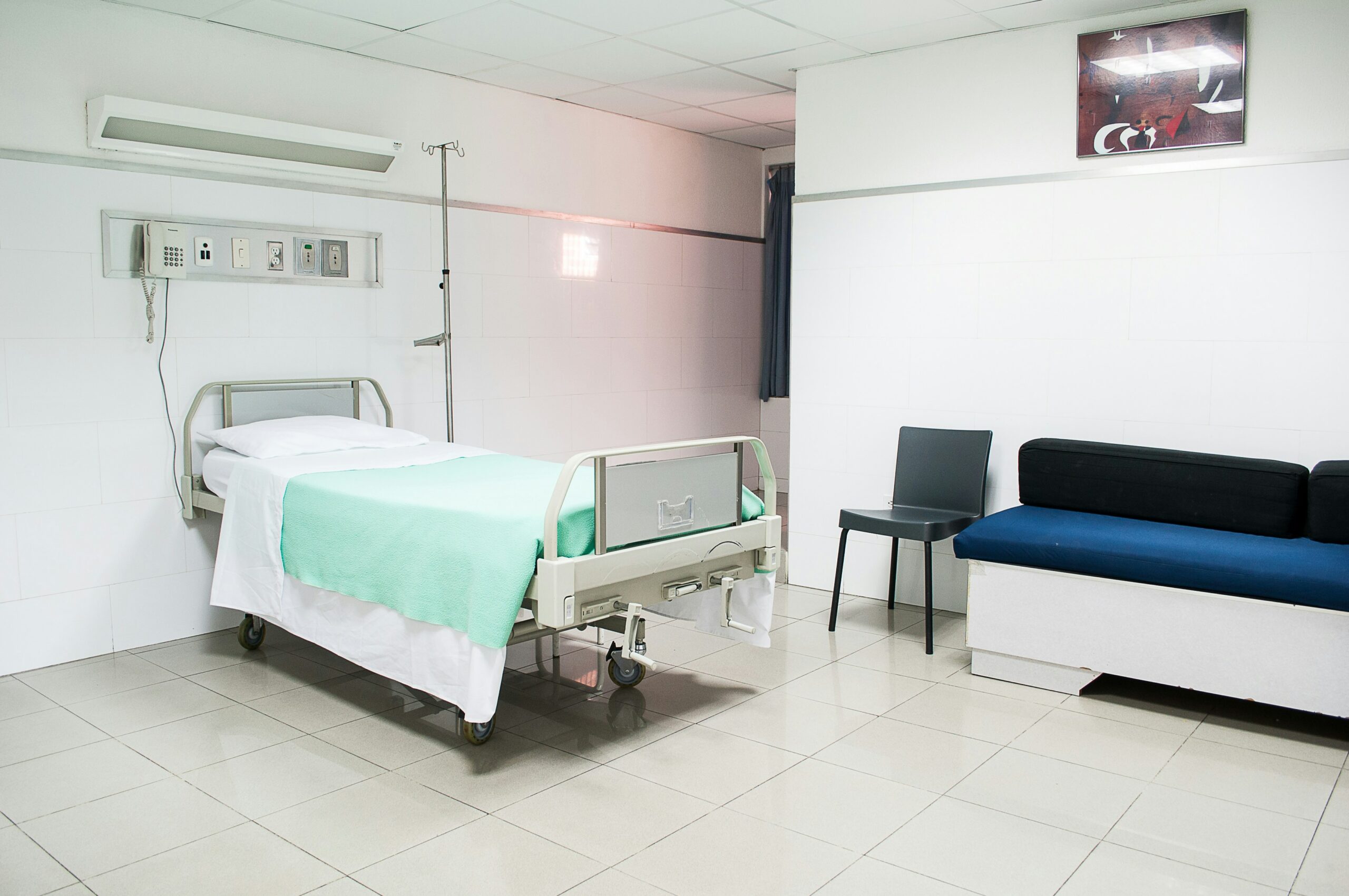 A hospital bed sitting empty in a hospital. In acute care cases, the speed of care and how treatment is communicated is essential.