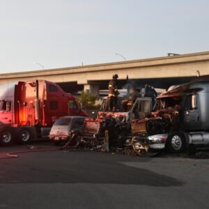 The scene of a truck accident where there was occupant compartment intrusion from the truck, as well as injuries.