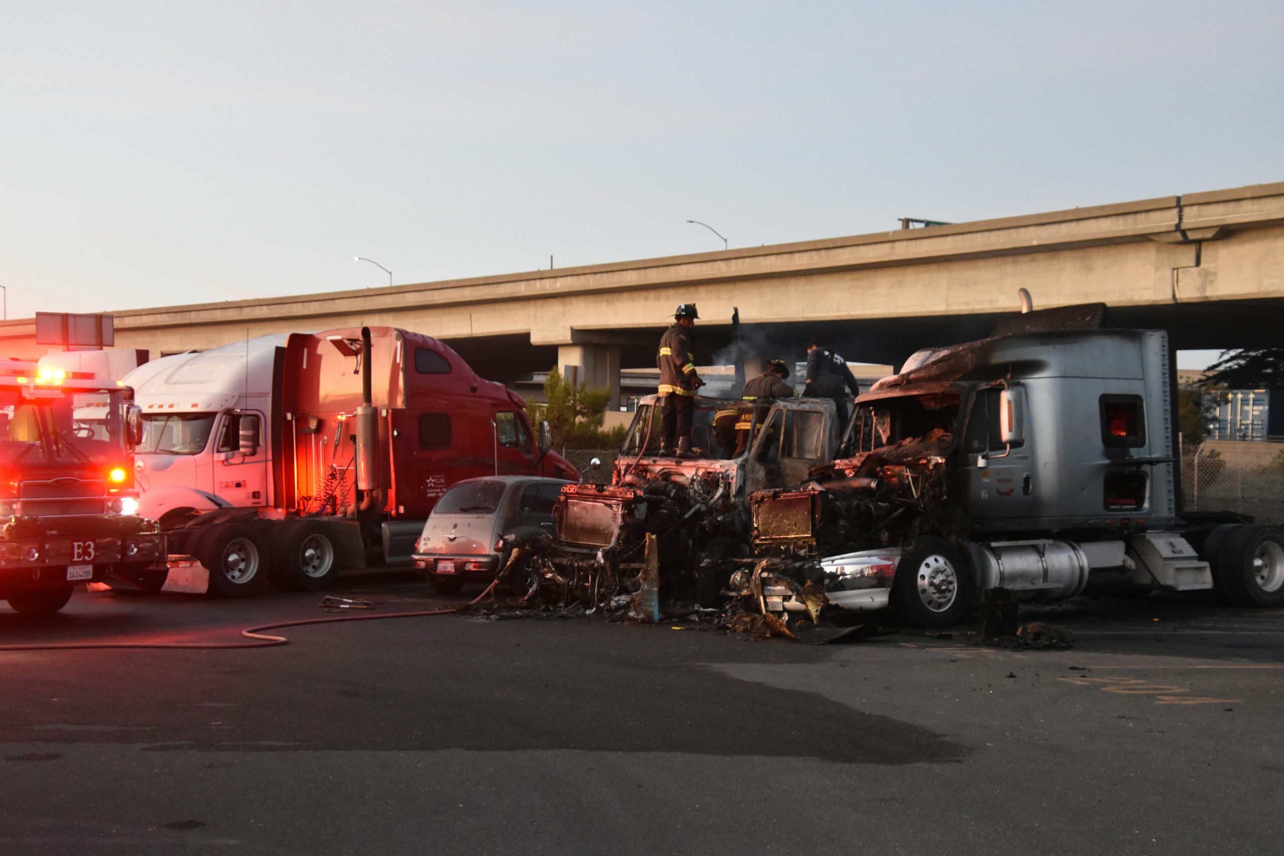 The scene of a truck accident where there was occupant compartment intrusion from the truck, as well as injuries.