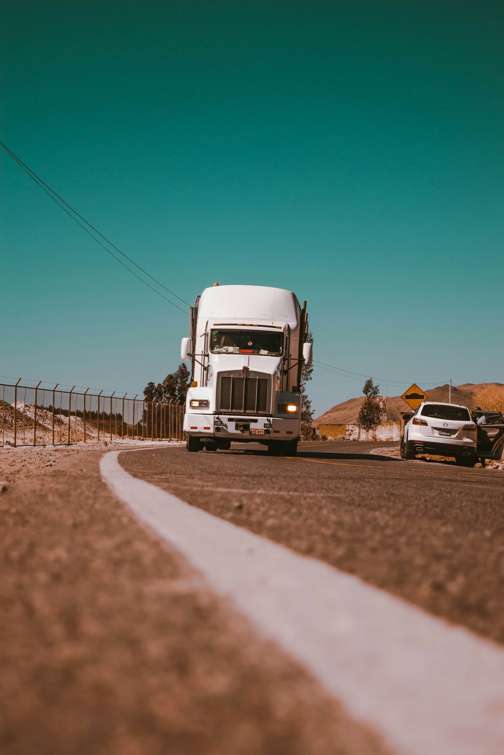 A truck pulled over on the side of a road after a truck accident. Black box data may be used to determine exactly what happened to the truck before and during the accident.