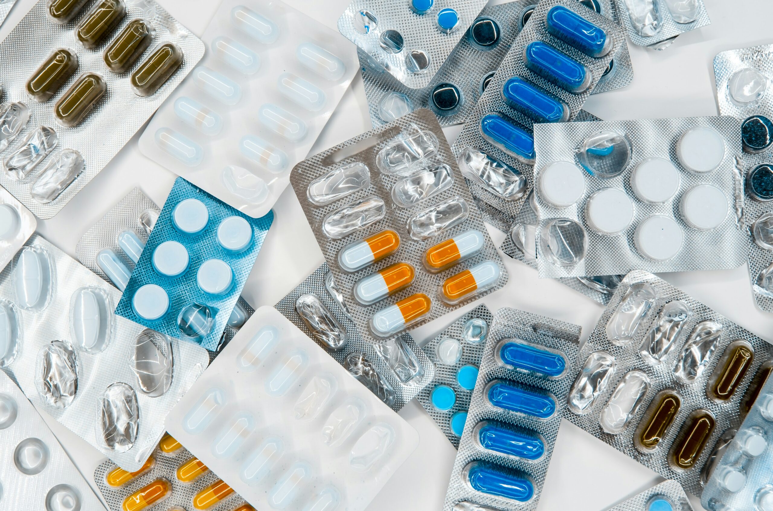 Failure to warn in pharmaceutical cases can cause harm. The image shows numerous medications.