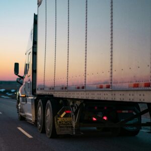 The trailer part of a commercial truck. There are rules and regulations that should protect against improperly loaded cargo, but should it happen, it can cause accidents.