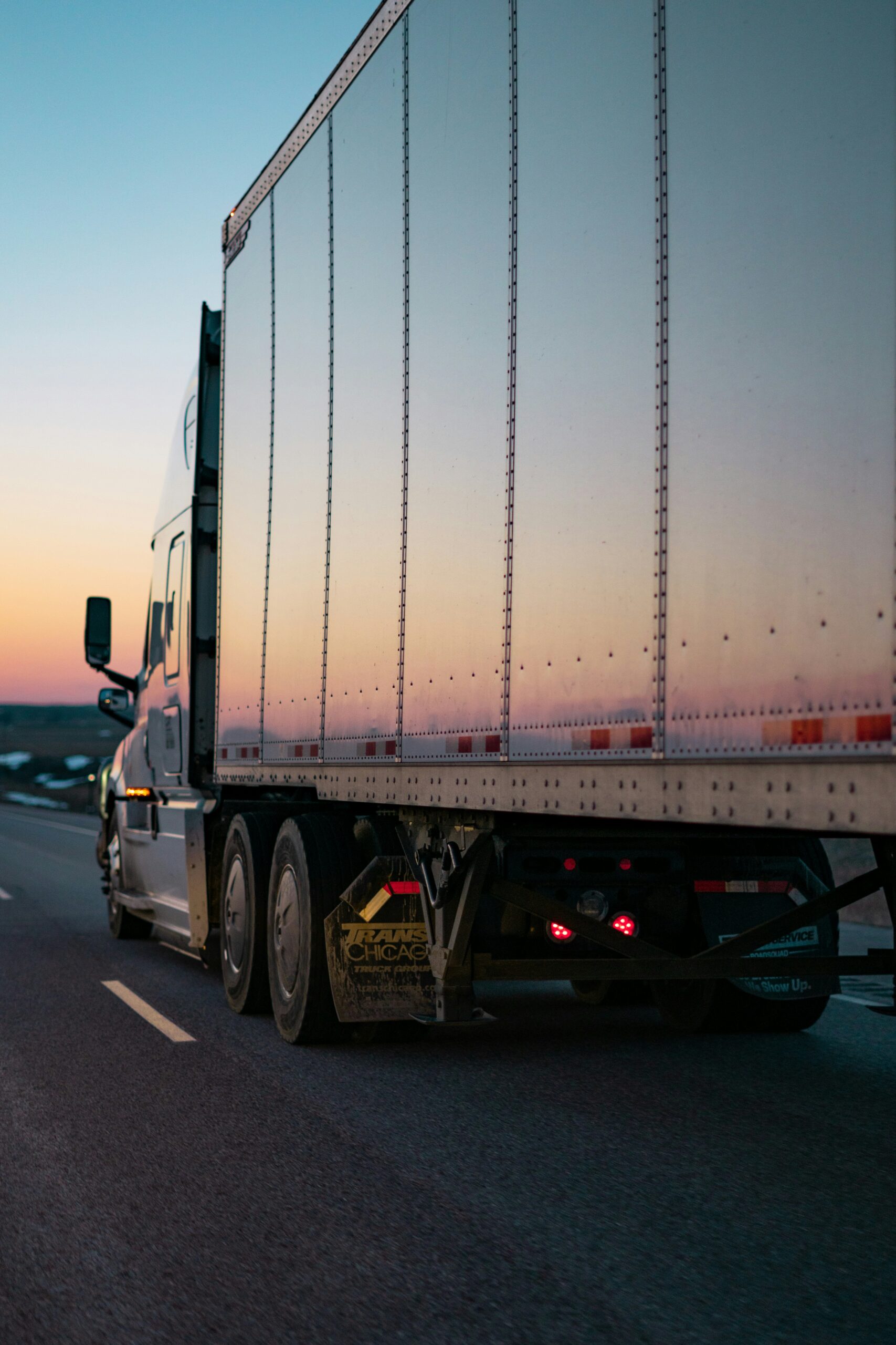 The trailer part of a commercial truck. There are rules and regulations that should protect against improperly loaded cargo, but should it happen, it can cause accidents.