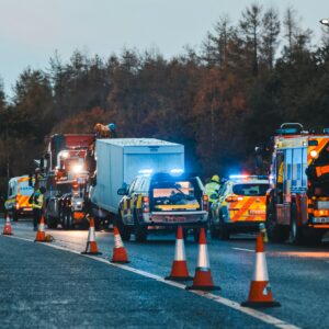 The image of an accident. A truck jackknifing can cause other drivers to collide.