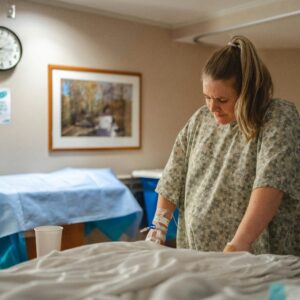 A pregnant woman laboring in a hospital. Maternal hemorrhage may happen suddenly or due to various complications. Regardless of the cause, it must be dealt with quickly to prevent injury to the mother and child.