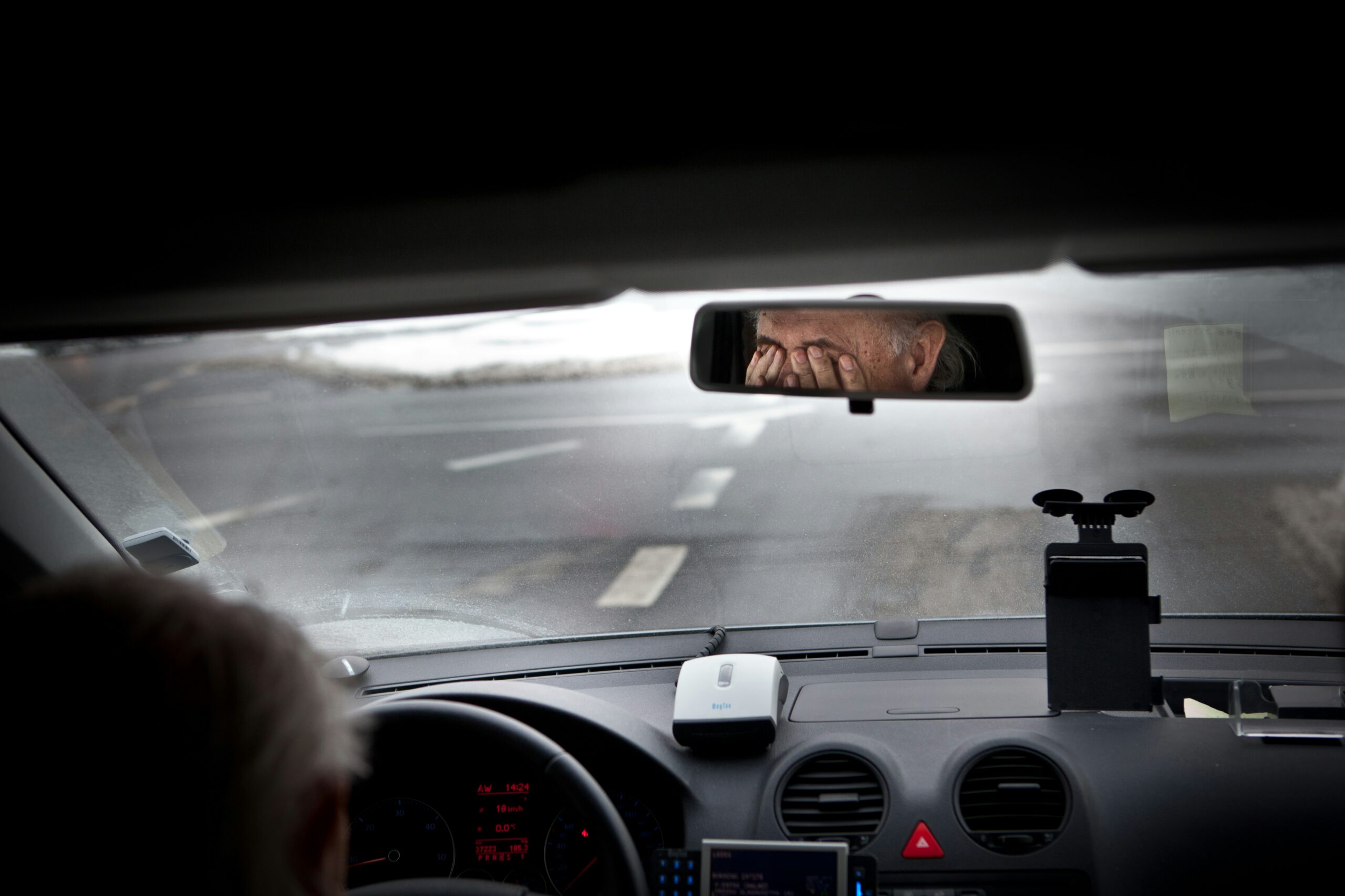 A drowsy truck driver on a darkening road. Hours-of-service violations do not always result in accidents or fatigue, but when they do, they will play a role in truck accident litigation.