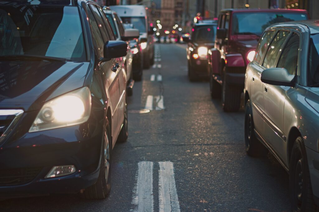 A scenario where a chain-reaction truck accident takes places would most likely occur here, where multiple vehicles are lined up with very little space between them.