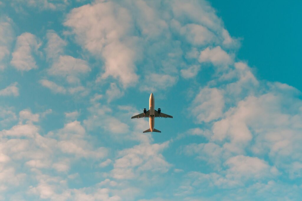 A plane flying high in the sky. During loss of aircraft control, such a plane may cause a disaster, leading to injuries and death among the occupants.